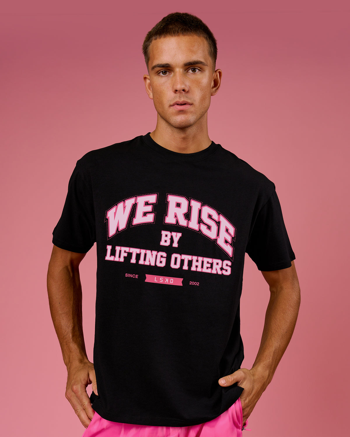 Man wearing BCAM FLXCotton Graphic Oversized Tee - Black | Model:Albert | Size:M