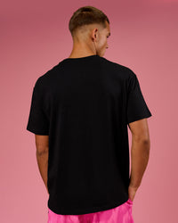 Man wearing BCAM FLXCotton Graphic Oversized Tee - Black | Model:Albert | Size:M | Thumbnail Index: 4