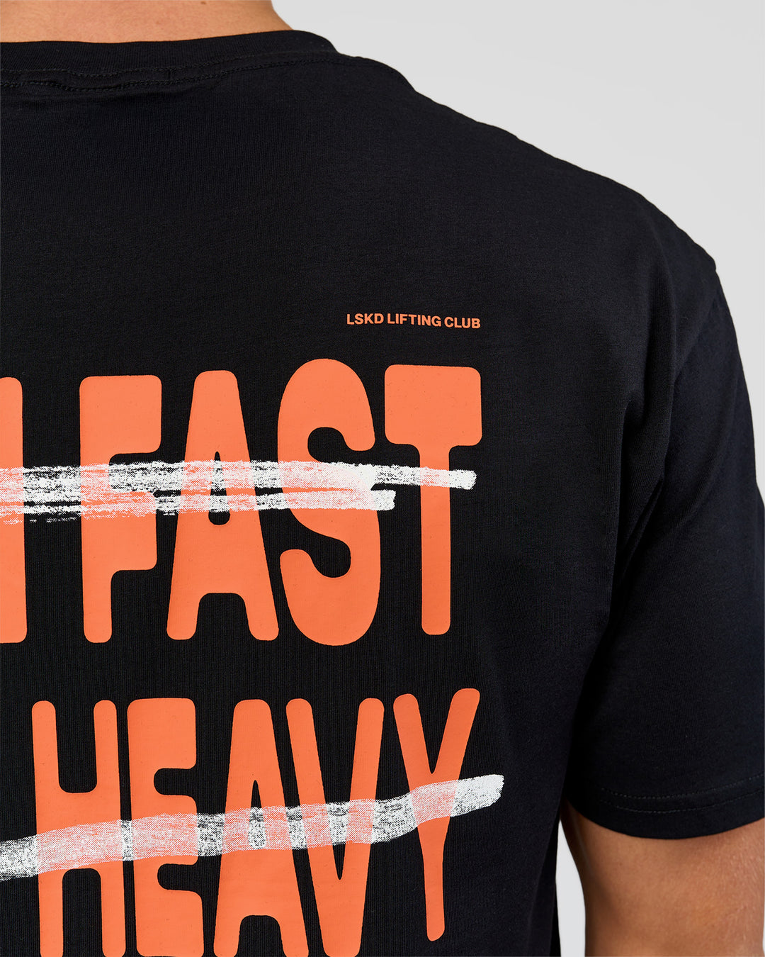 Man wearing Coffee Run FLXCotton Oversized Tee - Black-Ultra Orange | Model:Albert | Size:M - view 6