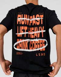 Man wearing Coffee Run FLXCotton Oversized Tee - Black-Ultra Orange | Model:Albert | Size:M | Thumbnail Index: 12