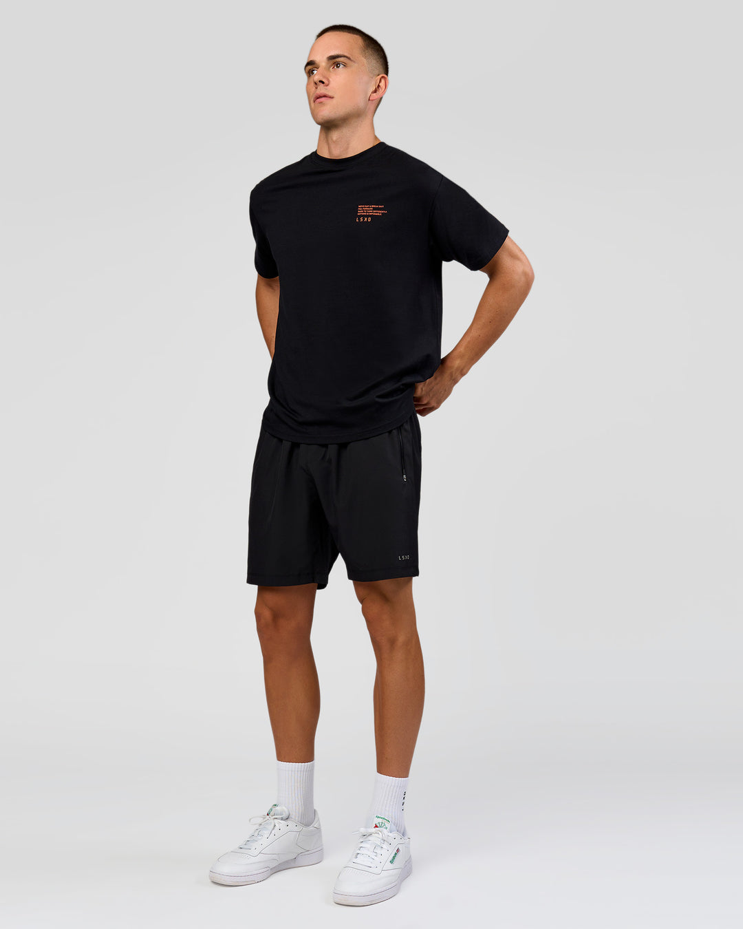 Man wearing Coffee Run FLXCotton Oversized Tee - Black-Ultra Orange | Model:Albert | Size:M - view 15