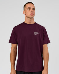 Man wearing Coffee Run FLXCotton Oversized Tee - Cherry Lacquer-Black | Model:Albert | Size:M | Thumbnail Index: 7