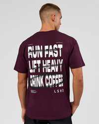 Man wearing Coffee Run FLXCotton Oversized Tee - Cherry Lacquer-Black | Model:Albert | Size:M | Thumbnail Index: 16