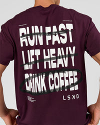 Man wearing Coffee Run FLXCotton Oversized Tee - Cherry Lacquer-Black | Model:Albert | Size:M | Thumbnail Index: 20