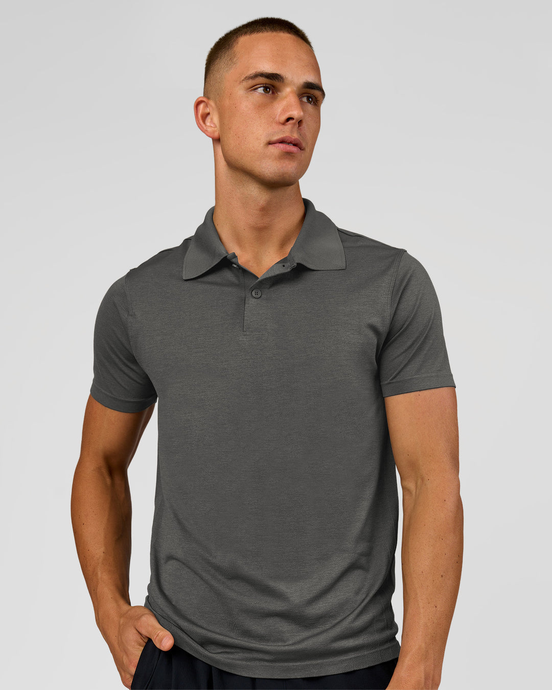 Man wearing Drive Seamless Polo - Dark Storm | Model:Albert | Size:M - view 1