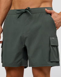 Man wearing Functional Cargo 6" Short - Carbon Green | Model:Albert | Size:M