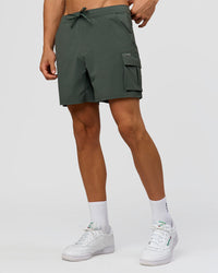 Man wearing Functional Cargo 6" Short - Carbon Green | Model:Albert | Size:M
