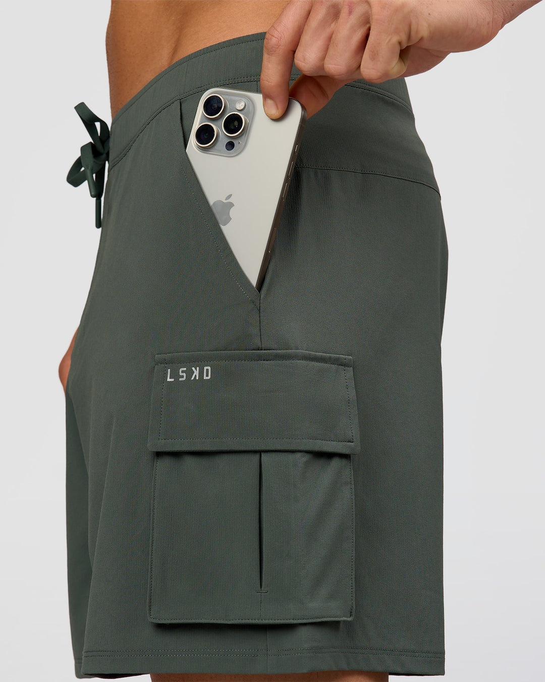 Man wearing Functional Cargo 6" Short - Carbon Green | Model:Albert | Size:M