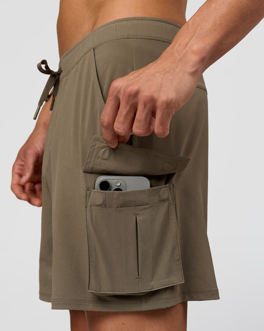Man wearing Functional Cargo 6" Short - Walnut Grey | Model:Albert | Size:M