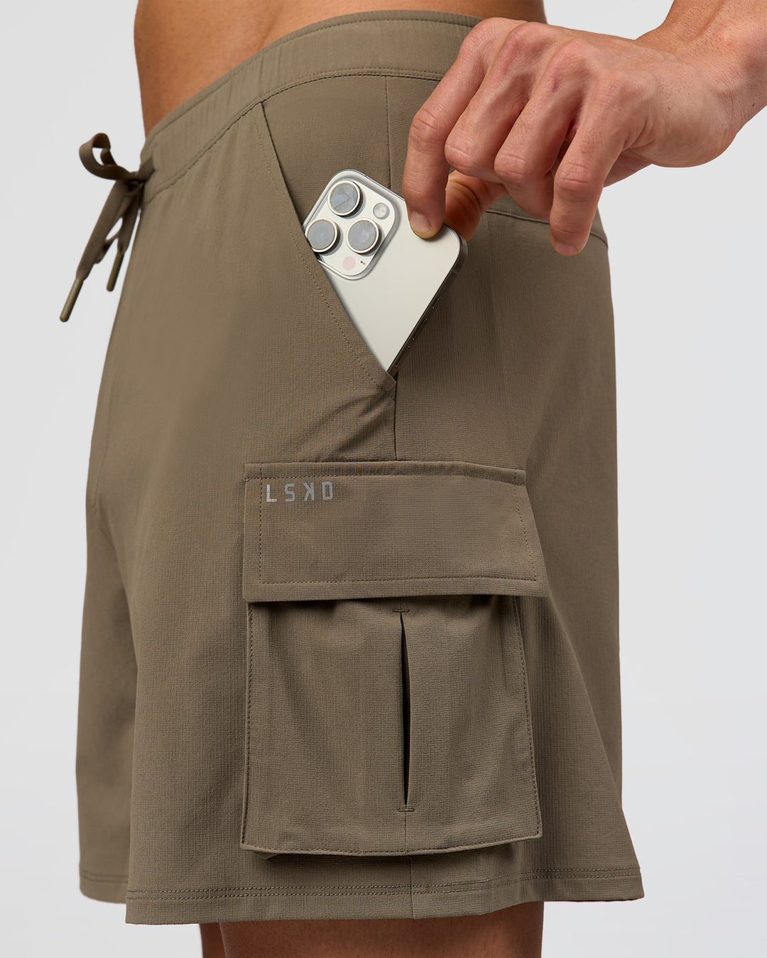 Man wearing Functional Cargo 6" Short - Walnut Grey | Model:Albert | Size:M