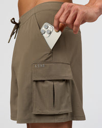 Man wearing Functional Cargo 6" Short - Walnut Grey | Model:Albert | Size:M