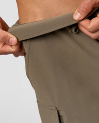 Man wearing Functional Cargo 6" Short - Walnut Grey | Model:Albert | Size:M