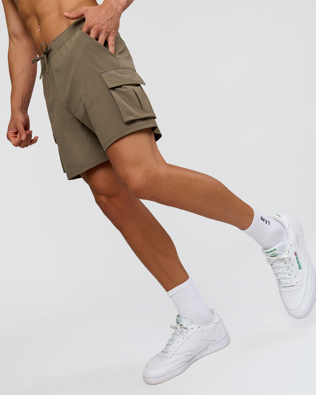 Man wearing Functional Cargo 6" Short - Walnut Grey | Model:Albert | Size:M