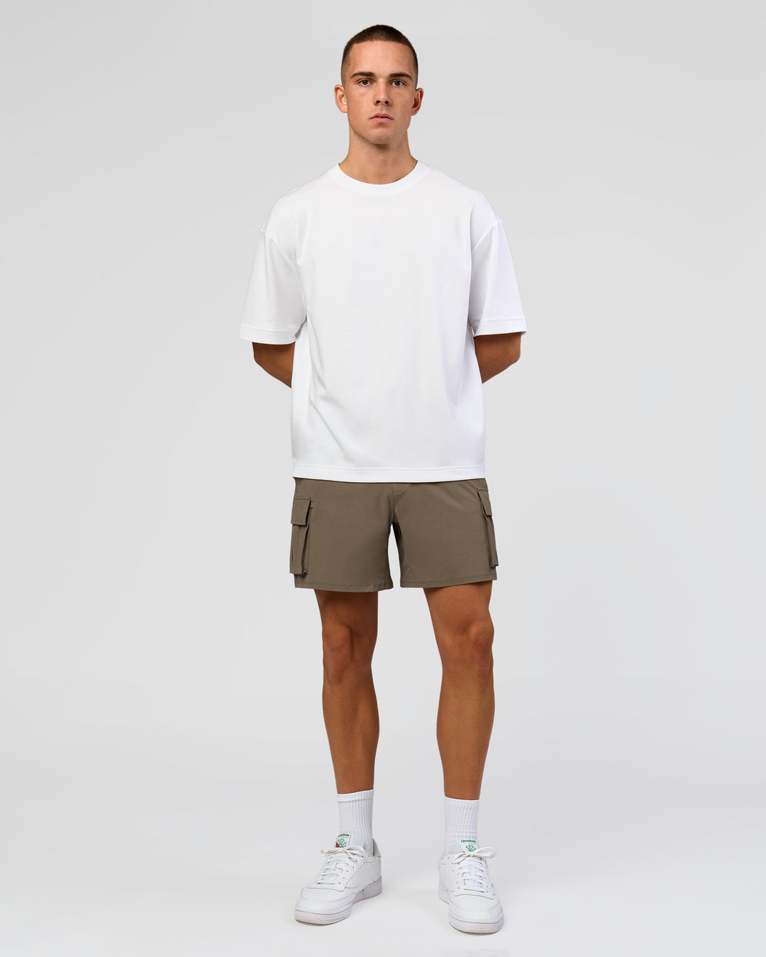 Man wearing Functional Cargo 6" Short - Walnut Grey | Model:Albert | Size:M