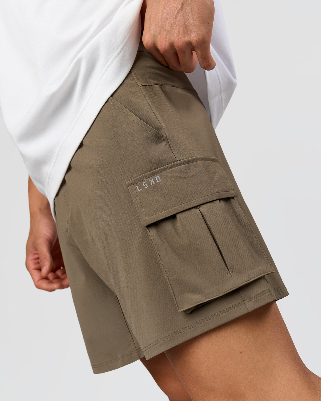 Man wearing Functional Cargo 6" Short - Walnut Grey | Model:Albert | Size:M