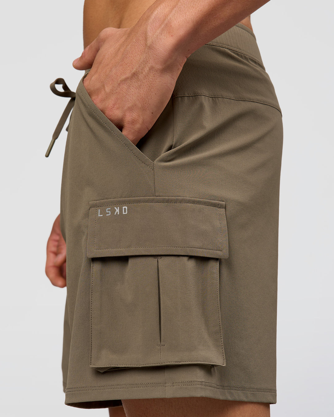 Man wearing Functional Cargo 6" Short - Walnut Grey | Model:Albert | Size:M