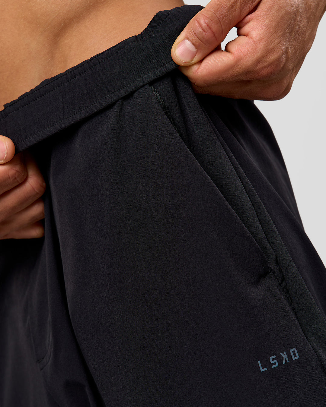 Man wearing Motion Wide Leg Pant - Black | Model:Albert | Size:M - view 5