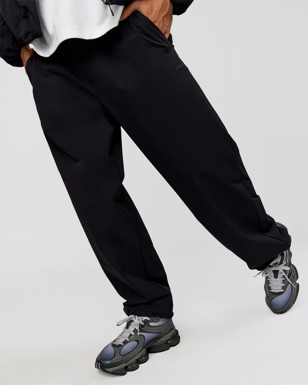 Man wearing Motion Wide Leg Pant - Black | Model:Albert | Size:M - view 12