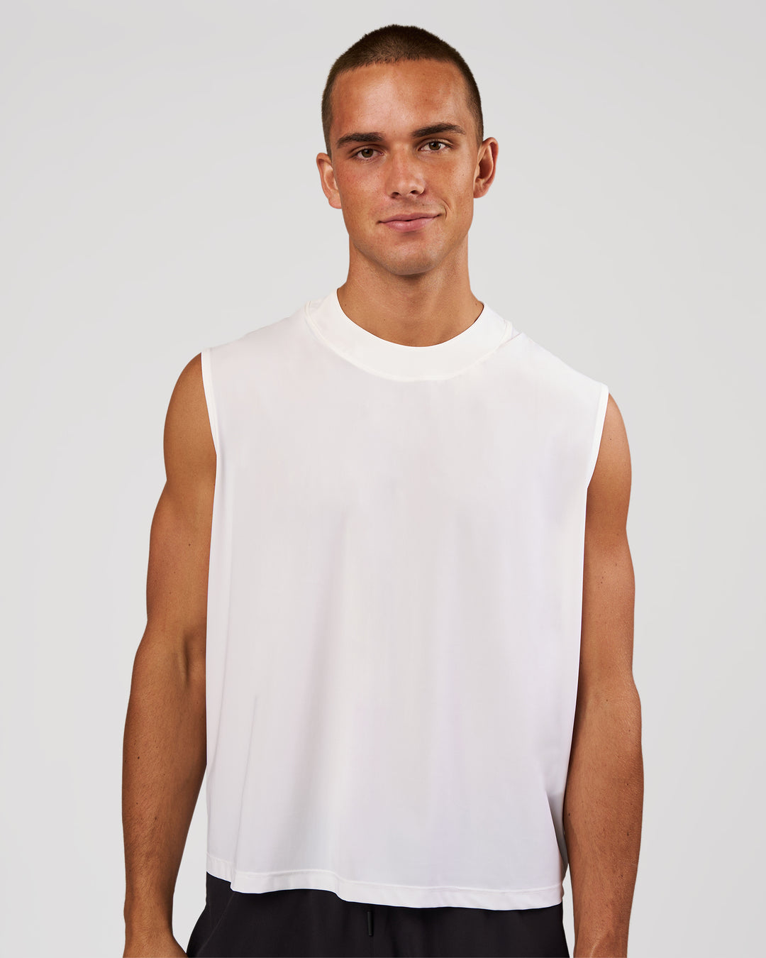 Man wearing Motionline Boxy Tank - White | Model:Albert | Size:M - view 5