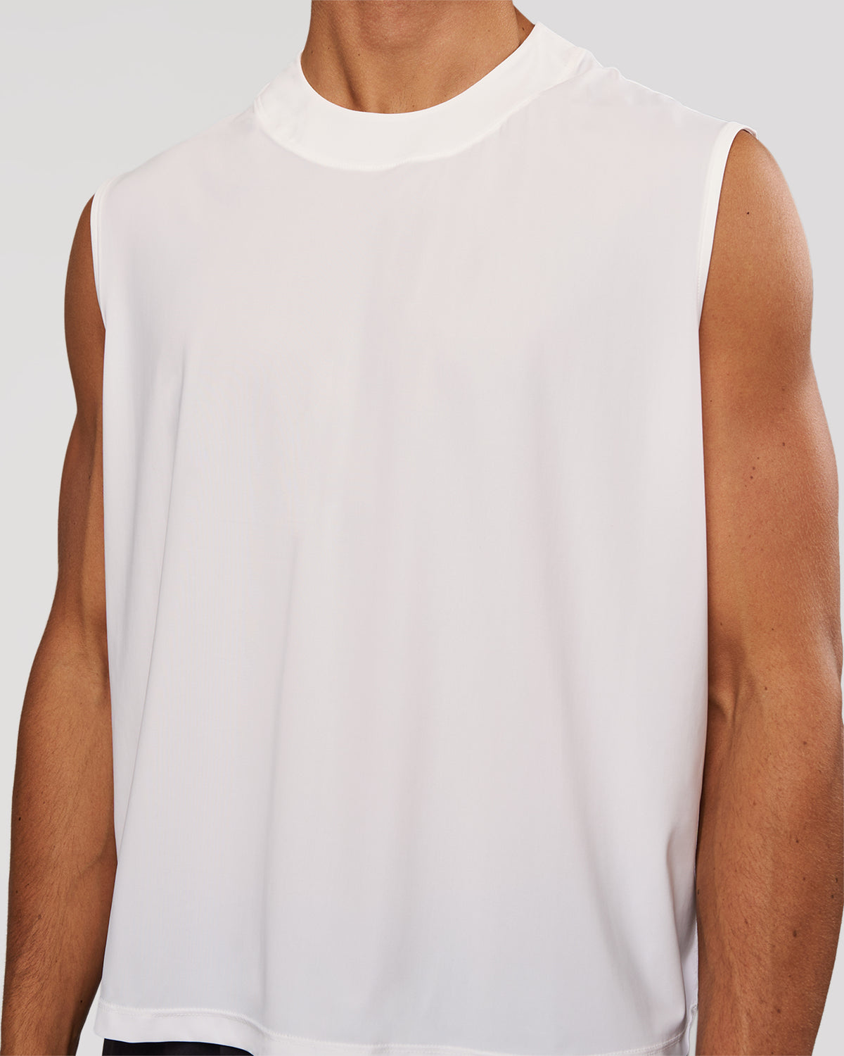 Man wearing Motionline Boxy Tank - White | Model:Albert | Size:M - view 2