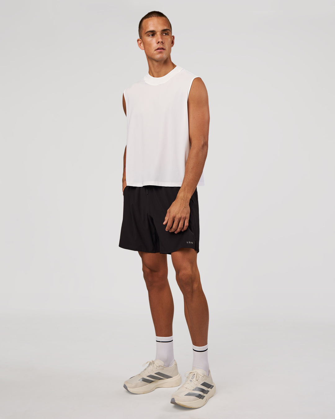 Man wearing Motionline Boxy Tank - White | Model:Albert | Size:M - view 10
