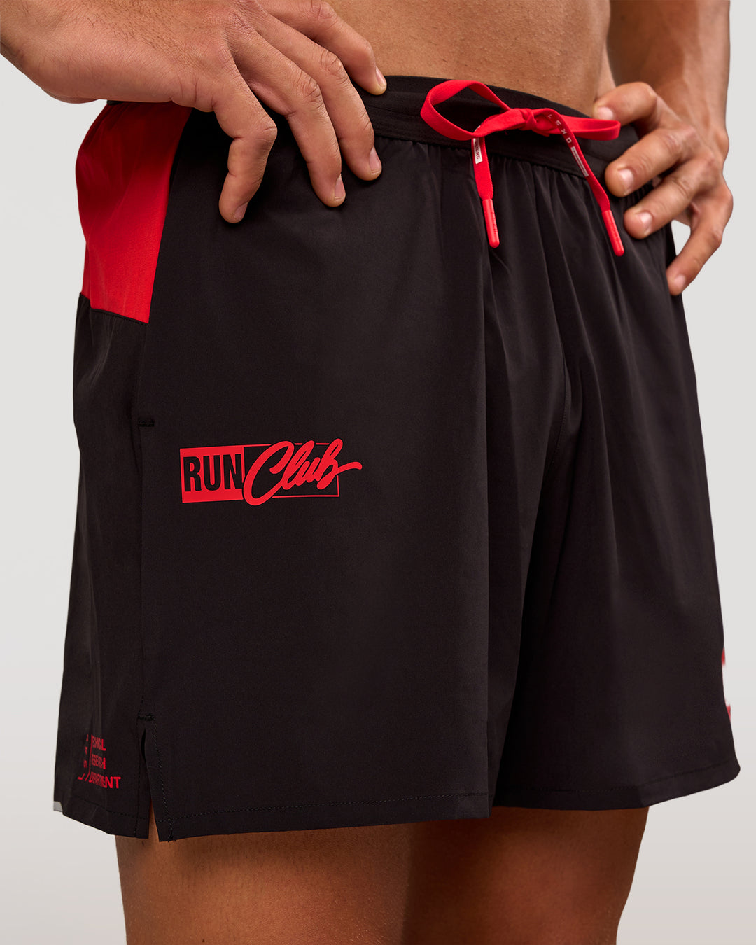 Man wearing Pace 5" Lined Running Short - Black-Scarlet | Model:Albert | Size:M - view 1