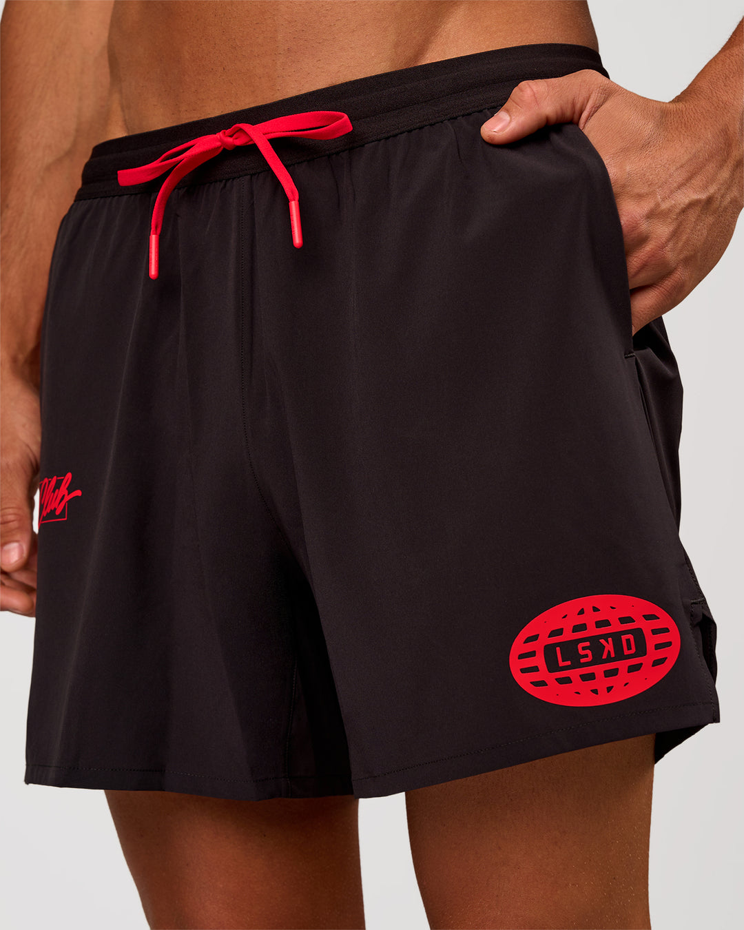 Man wearing Pace 5" Lined Running Short - Black-Scarlet | Model:Albert | Size:M - view 3