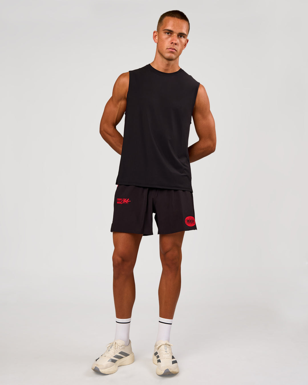 Man wearing Pace 5" Lined Running Short - Black-Scarlet | Model:Albert | Size:M - view 6
