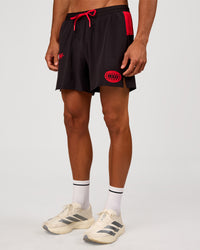 Man wearing Pace 5" Lined Running Short - Black-Scarlet | Model:Albert | Size:M | Thumbnail Index: 12