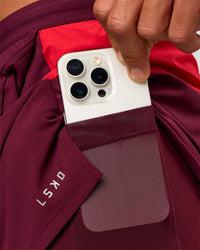Man wearing Pace 5" Lined Running Short - Cherry Lacquer-Scarlet | Model:Albert | Size:M | Thumbnail Index: 7