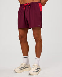 Man wearing Pace 5" Lined Running Short - Cherry Lacquer-Scarlet | Model:Albert | Size:M | Thumbnail Index: 10