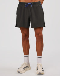 Man wearing Pace 5" Lined Running Short - Dark Storm-Bluebell | Model:Albert | Size:M | Thumbnail Index: 4