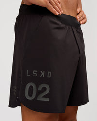 Man wearing Pace 5" Lined Running Short - Game Plan Black | Model:Albert | Size:M | Thumbnail Index: 0