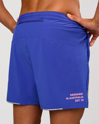 Man wearing Pace 5" Lined Running Short - Game Plan Power Cobalt | Model:Albert | Size:M | Thumbnail Index: 7