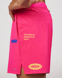 Man wearing Pace 5" Lined Running Short - Game Plan Ultra Pink | Model:Albert | Size:M | Thumbnail Index: 7