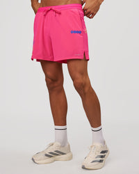 Man wearing Pace 5" Lined Running Short - Game Plan Ultra Pink | Model:Albert | Size:M | Thumbnail Index: 8