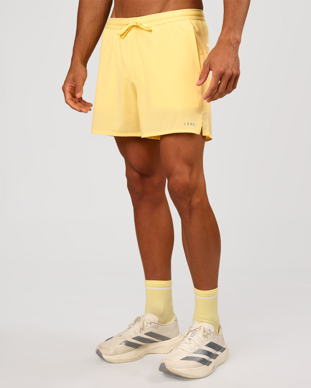 Man wearing Pace 5" Lined Running Short - Lemon | Model:Albert | Size:M - view 6