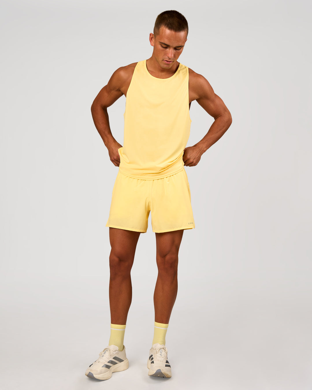 Man wearing Pace 5" Lined Running Short - Lemon | Model:Albert | Size:M - view 12