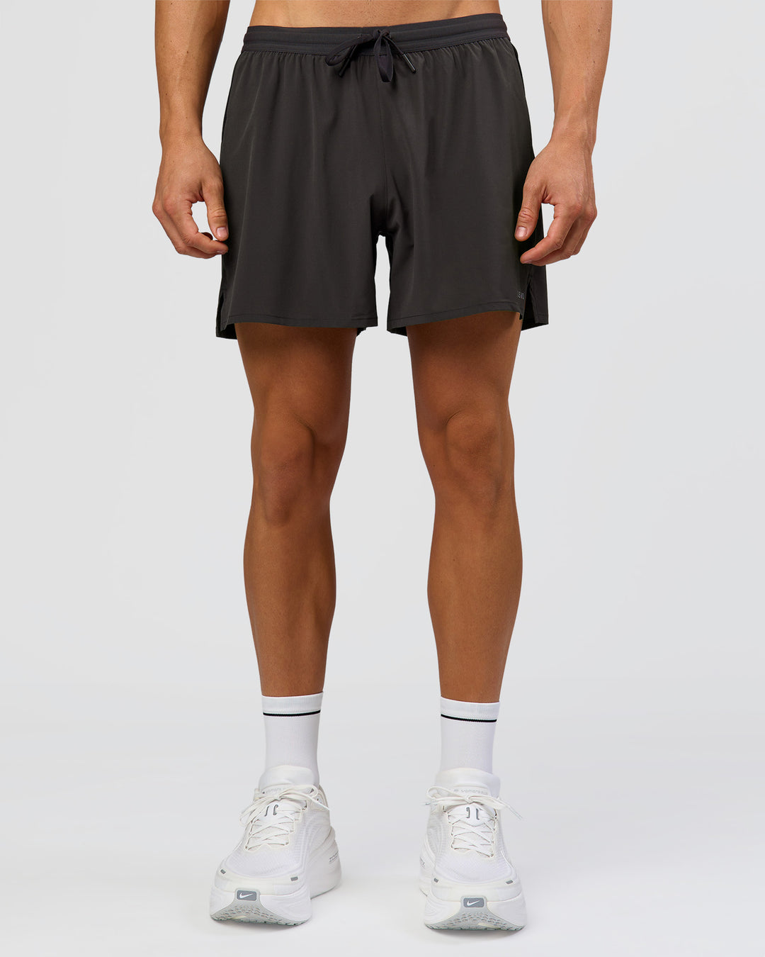 Man wearing Pace 5" Running Short - Black-Onyx | Model:Albert | Size:M