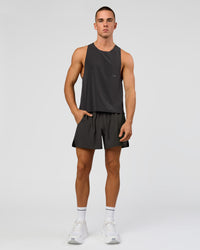 Man wearing Pace 5" Running Short - Black-Onyx | Model:Albert | Size:M