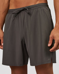 Man wearing Pace 7" Lined Running Short - Dark Storm | Model:Albert | Size:M | Thumbnail Index: 0