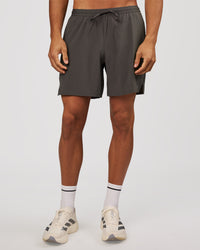 Man wearing Pace 7" Lined Running Short - Dark Storm | Model:Albert | Size:M | Thumbnail Index: 2