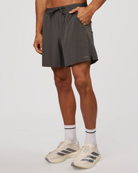 Man wearing Pace 7" Lined Running Short - Dark Storm | Model:Albert | Size:M | Thumbnail Index: 5