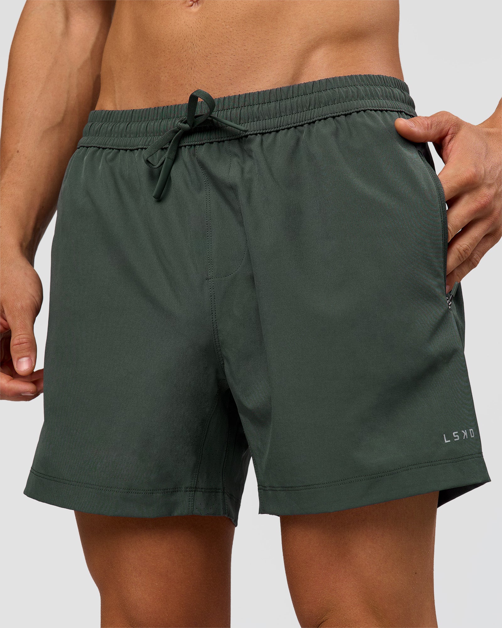 Man wearing Rep 5" Performance Short - Carbon Green | Model:Albert | Size:M