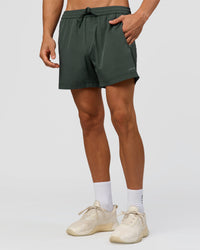 Man wearing Rep 5" Performance Short - Carbon Green | Model:Albert | Size:M