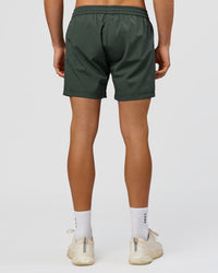 Man wearing Rep 5" Performance Short - Carbon Green | Model:Albert | Size:M