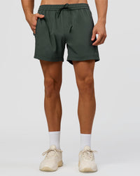Man wearing Rep 5" Performance Short - Carbon Green | Model:Albert | Size:M