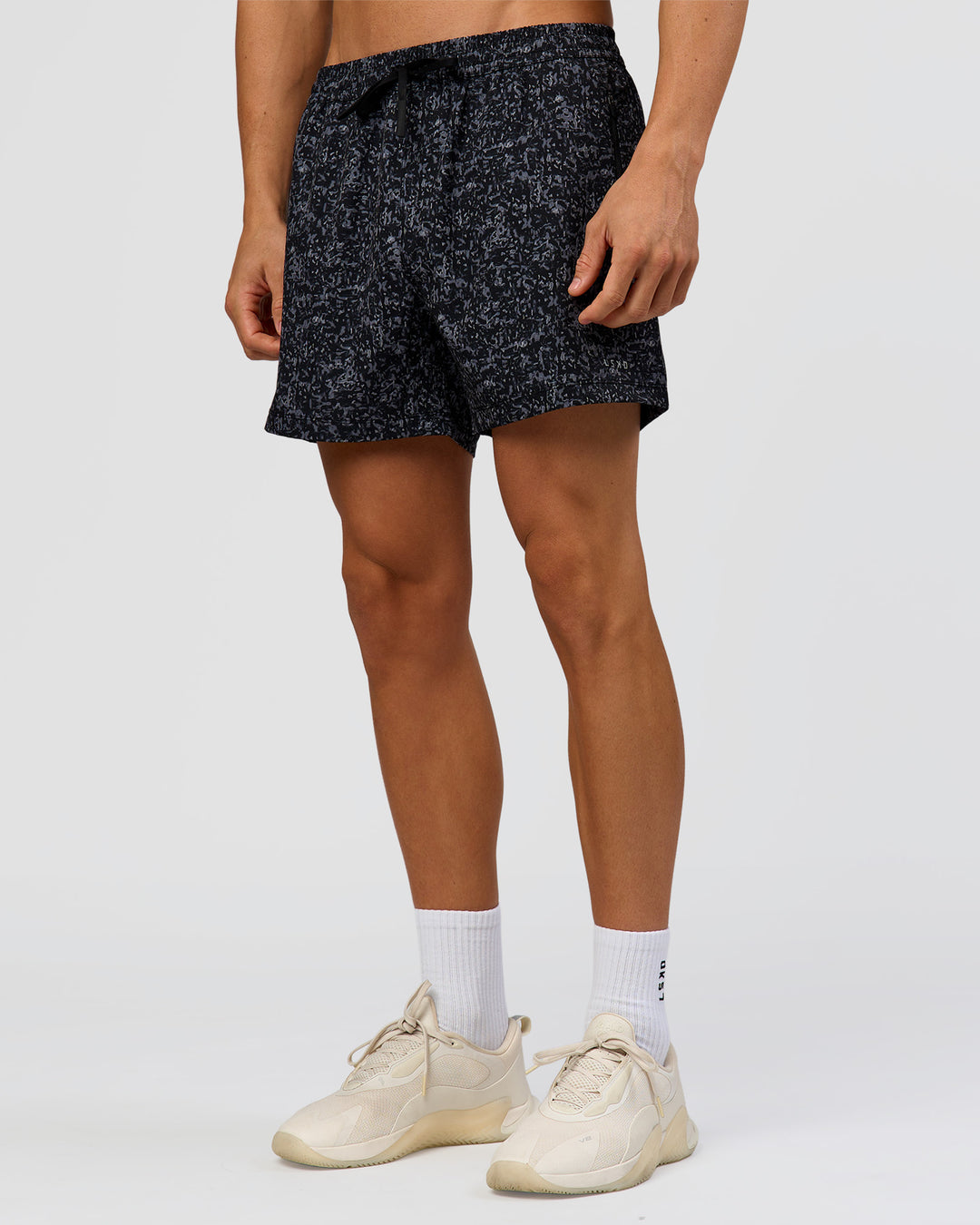 Man wearing Rep 5" Performance Short - Energy Print Black | Model:Albert | Size:M