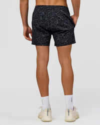 Man wearing Rep 5" Performance Short - Energy Print Black | Model:Albert | Size:M