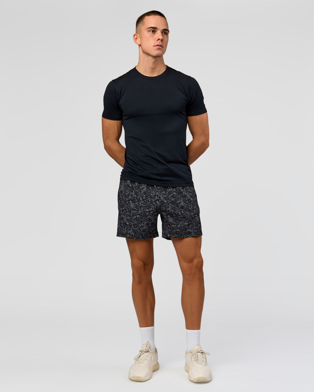 Man wearing Rep 5" Performance Short - Energy Print Black | Model:Albert | Size:M